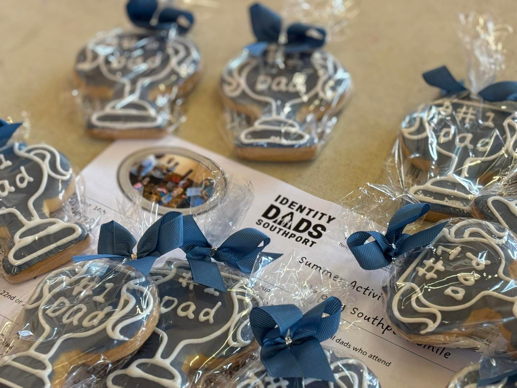 Decorated Dad biscuits beside an Identity Dads Southport card